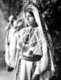 Palestine: A Palestinian woman of Ramallah wearing an embroidered dress, c. 1915