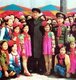 Korea: North Korea's 'Great Leader' Kim Il Sung (1912-1994), supreme ruler of the Democratic Republic of Korea (DPRK) between 1948 and 1994, posing with a group of children at Mangyongdae Fun Fair, 1982